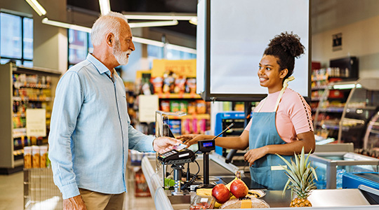 Man still able to use his OnPoint debit card at the grocery store while the system update takes place.