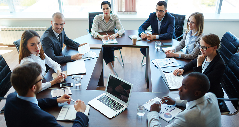 Diverse businesspeople having a discussion in board room