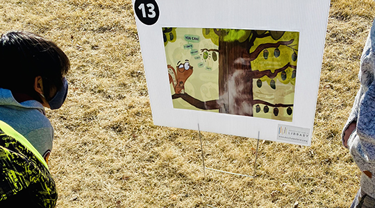 Image of children enjoying one of the stages of their Story Walk.
