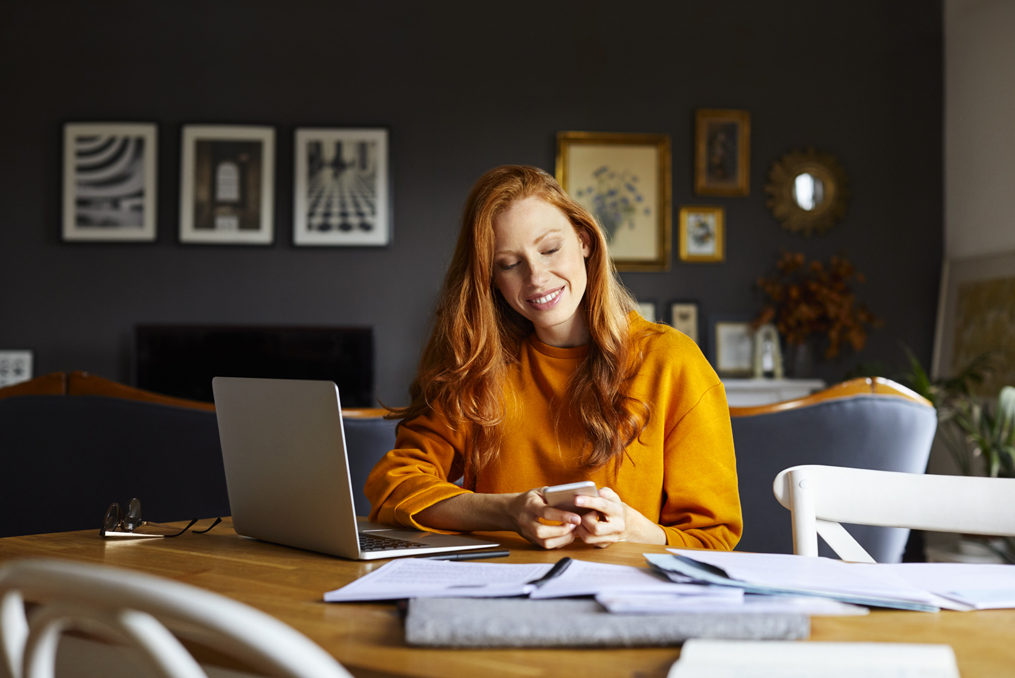 woman taking action changing passwords and reviewing documents