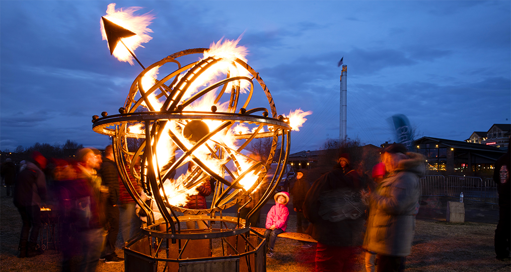 Bend Winterfest 2023 folks looking at a ring of fire