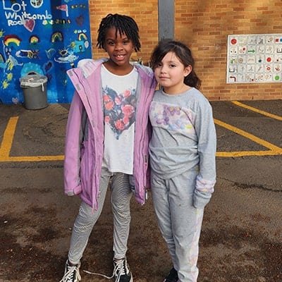 Two-girl-friends-at-school