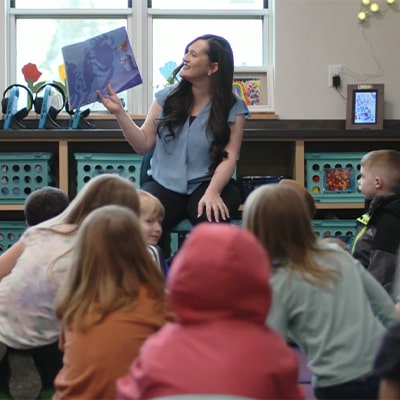 Jennifer Krebs reading to her classroom