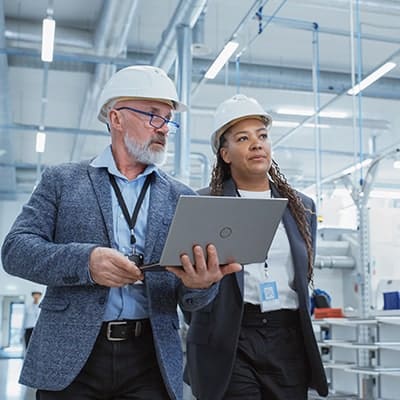 two people working at tech warehouse