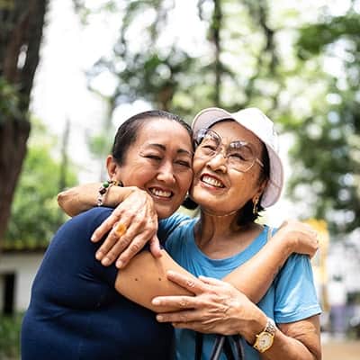 two woman hugging