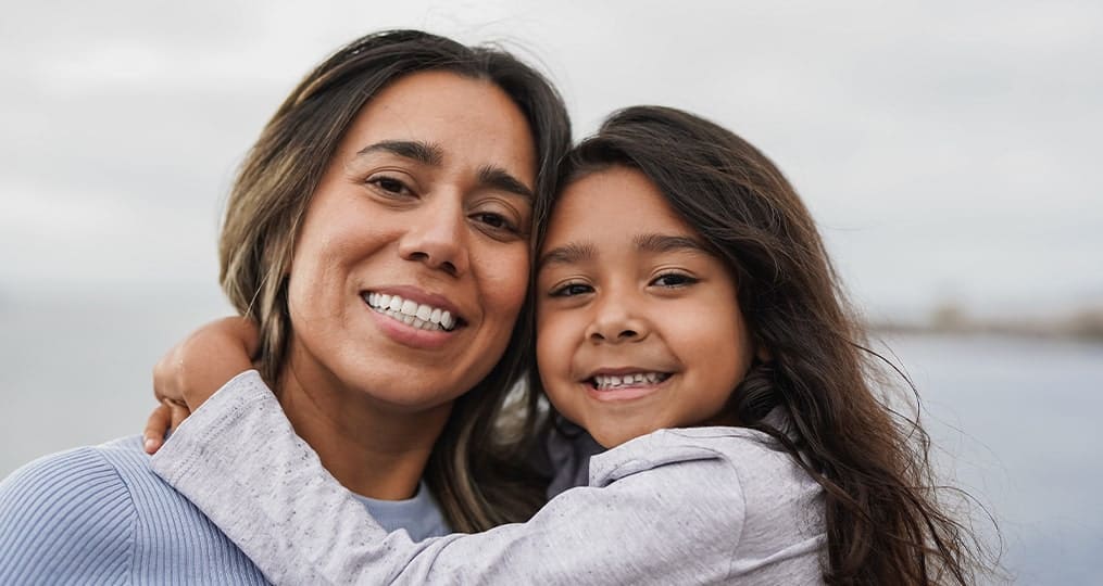 mom-and-daughter-smiling-together