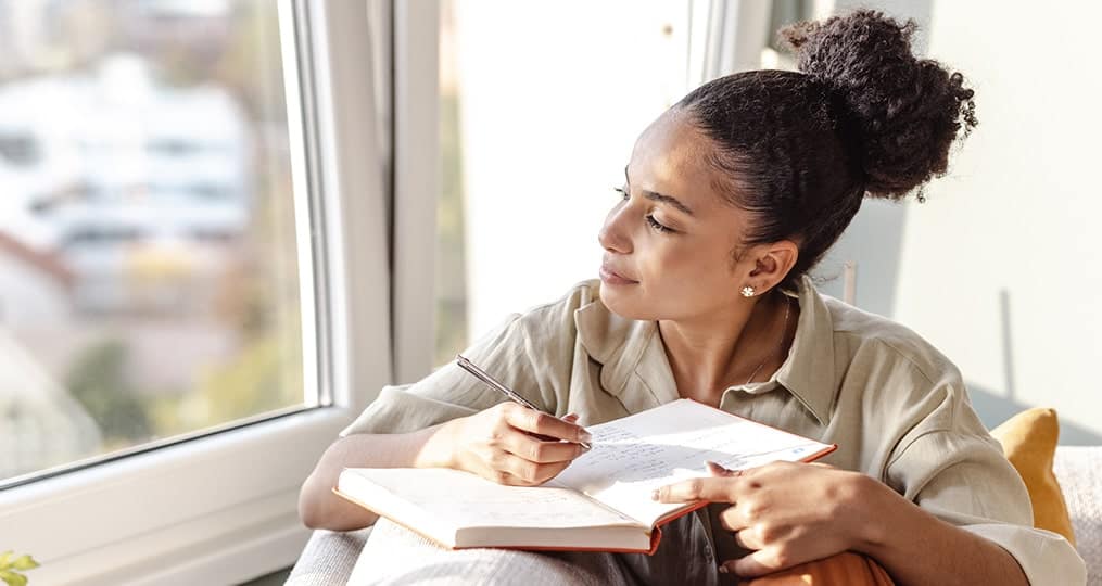 woman-writing in her journal