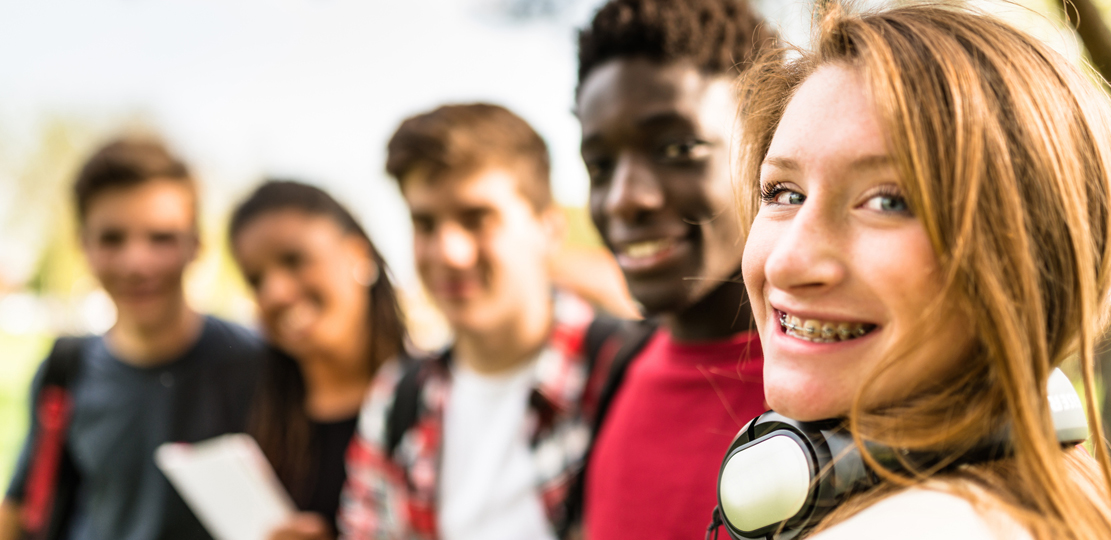 OnPoint Savers Account_Teenage Girl with Braces smiling with her friends