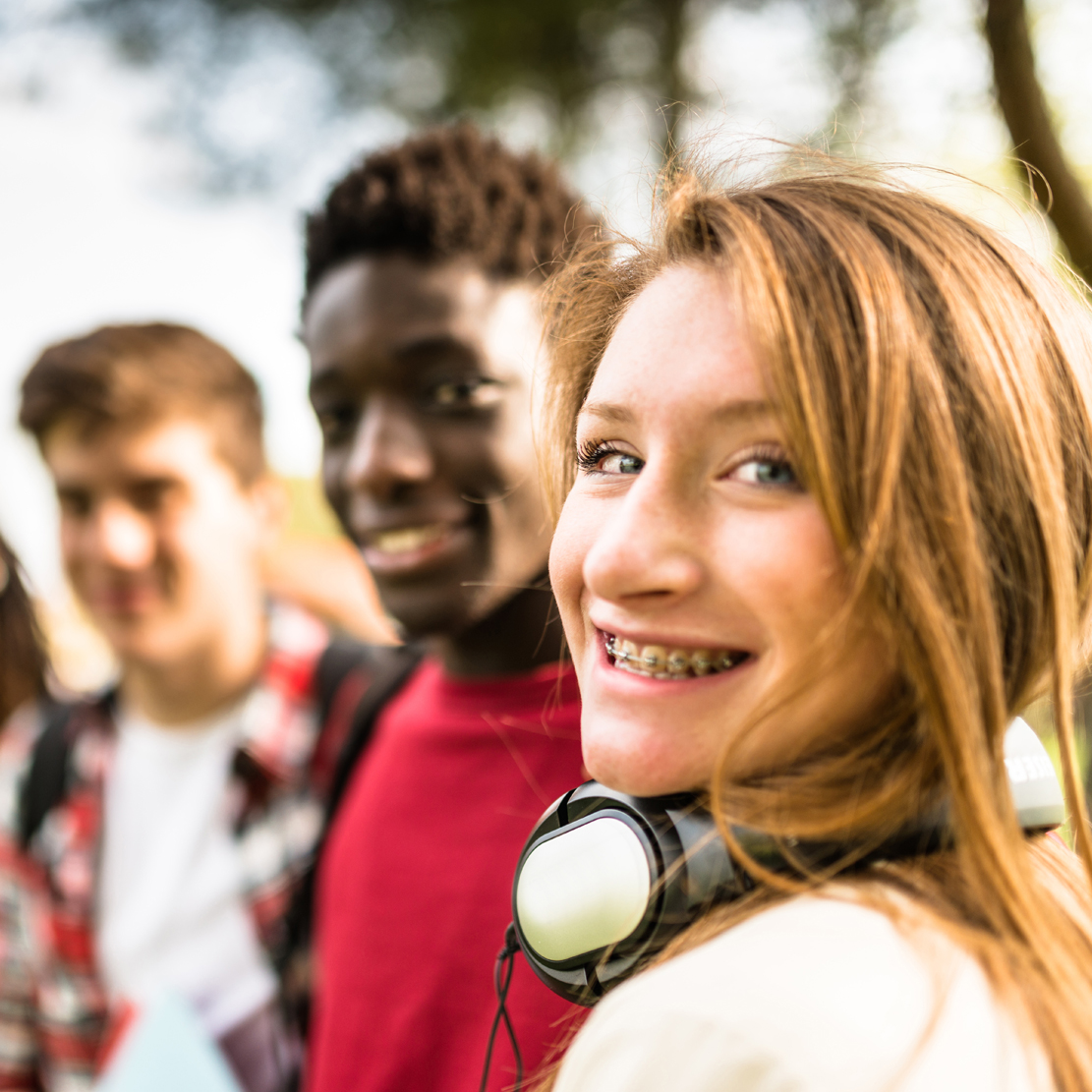 OnPoint Savers Account_Teenage Girl with Braces smiling with her friends