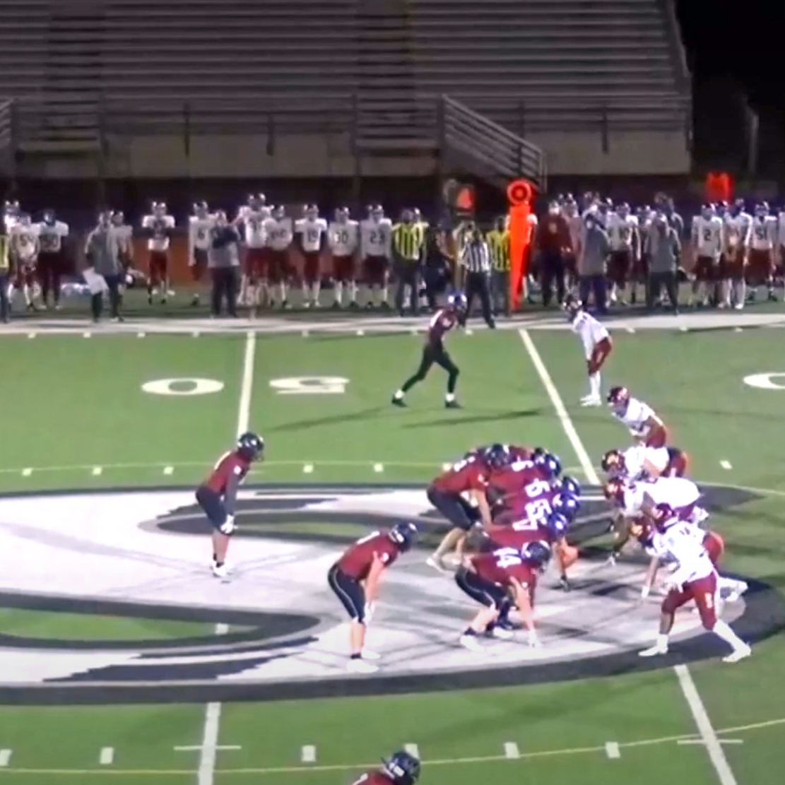 Sandy High School’s Live Broadcast Program_student performing football broadcast