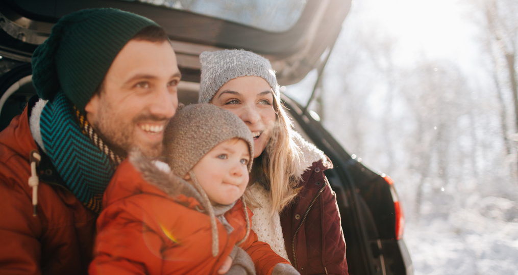 Two Debt Payment Philosophies - Avalanche and Snowball - Family on a winter road trip