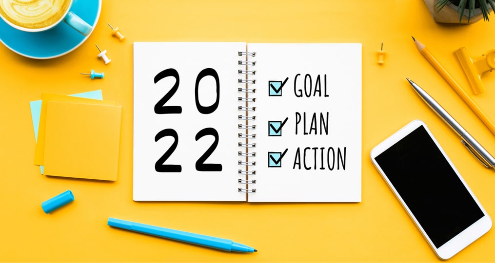 Commit-to-Getting-Financially-Fit-in-2022_to-do-list-on-yellow-table_1015x540-min