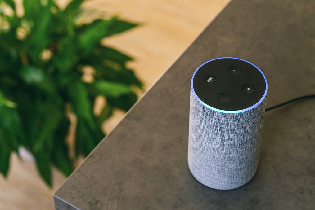 how to secure your smart speakers_smart speaker sitting on the kitchen counter at home