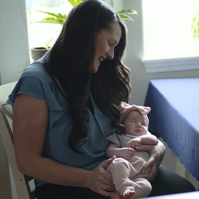 Jennifer Krebs holding her new born baby