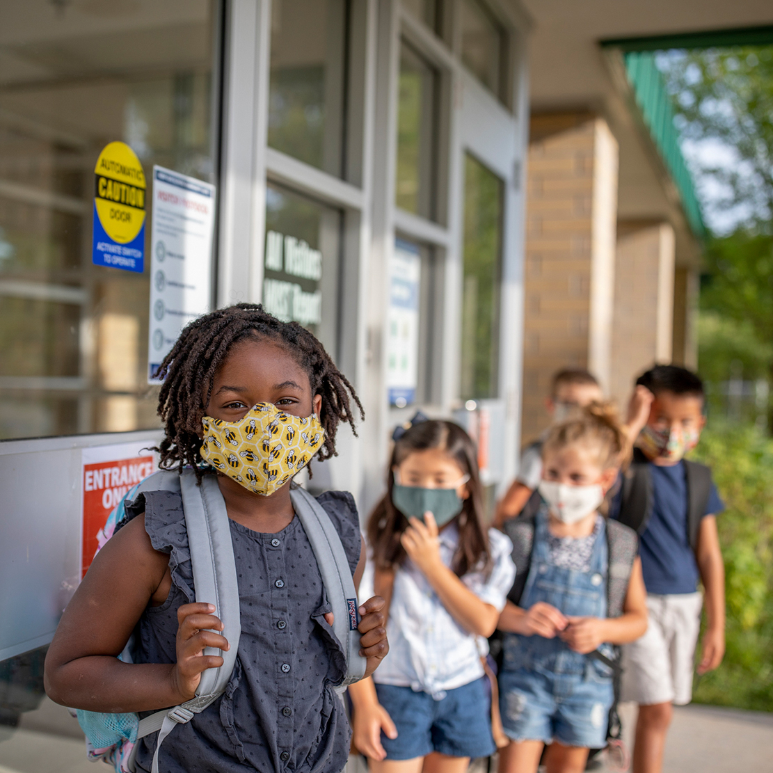 Working Hand-in-Hand to Close the Achievement Gap_diverse group of elementary students