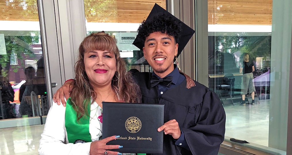 employee spotlight with Steve Martinez-photo of Steve at PSU graduation with mom