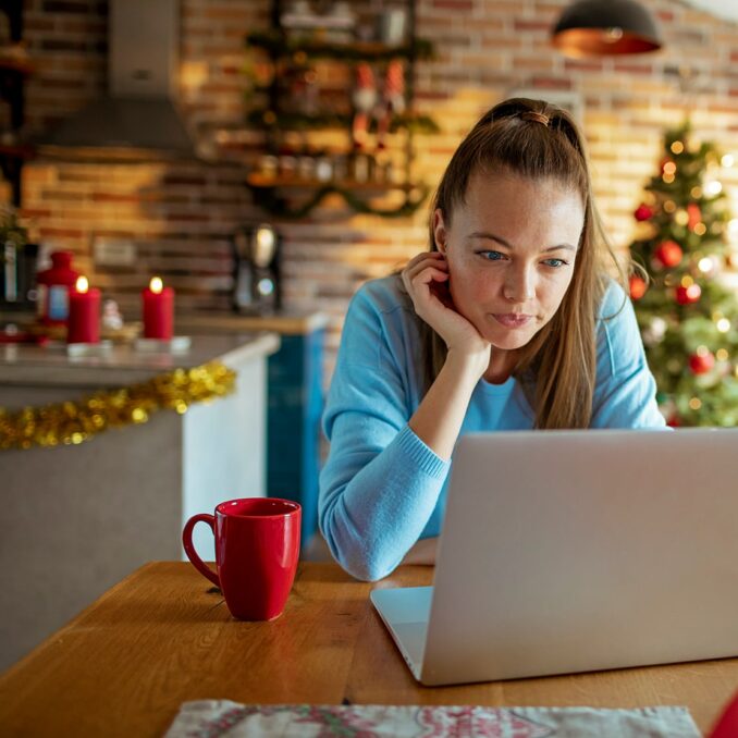 increase your line of credit for the holidays-woman reviewing her credit line options during the holidays
