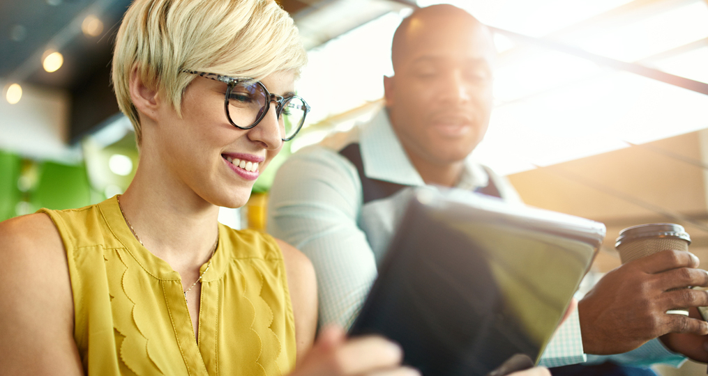 Announcing the New and Improved OnPoint Website_two people looking at a tablet