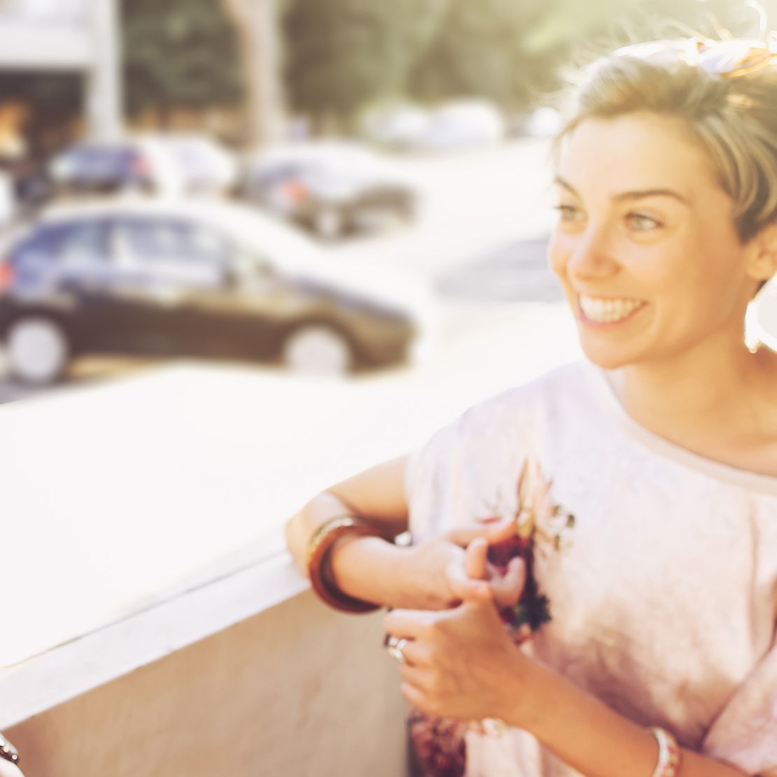 How to Buy Your Next Car with Confidence_Two women talking with car in the background