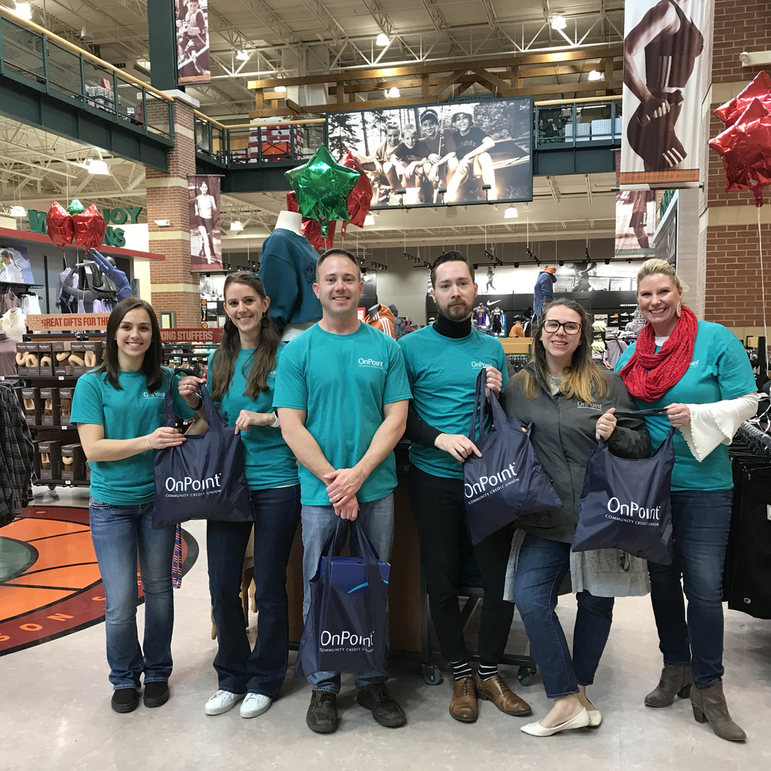 OSAA Foundation Student Assistance Program_OnPoint employees at Dick's Sporting Goods with purchased items for donation