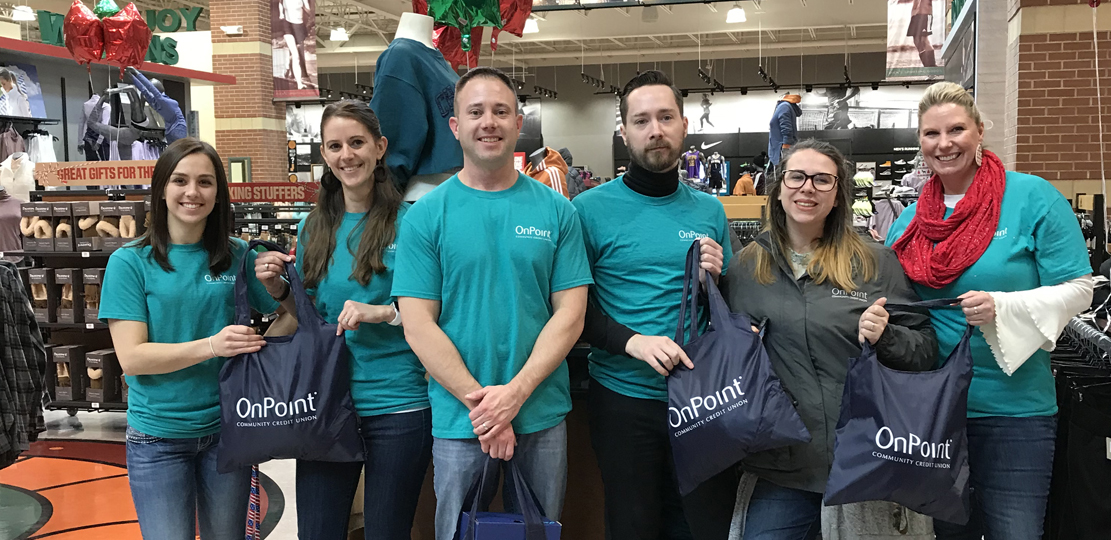 OSAA Foundation Student Assistance Program_OnPoint employees at Dick's Sporting Goods with purchased items for donation