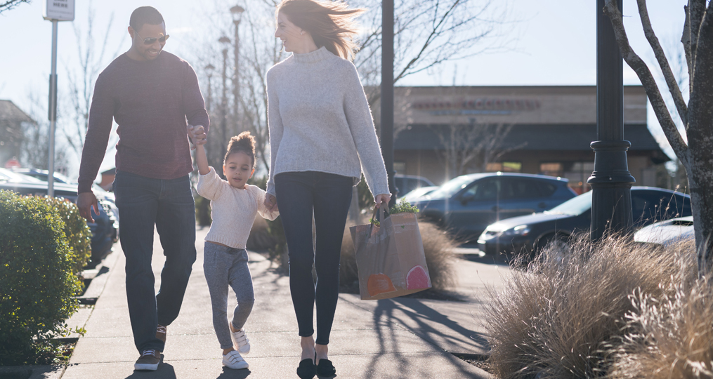 Savings tips you can bank on blog size_Family walking in a parking lot