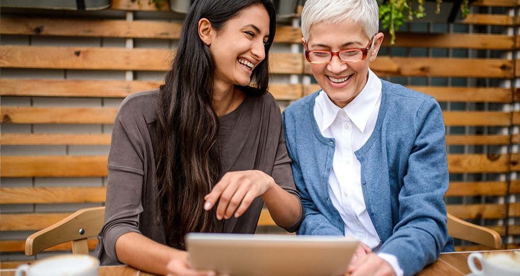 Ways to save for your first home_mom and daughter using tablet