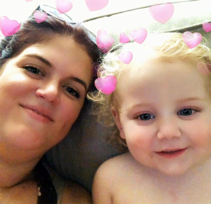 Lucy and her son taking photos with snapchat filters