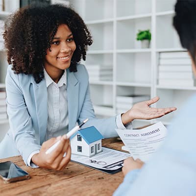 mortgage officer showing options to prospects local mortgage lender
