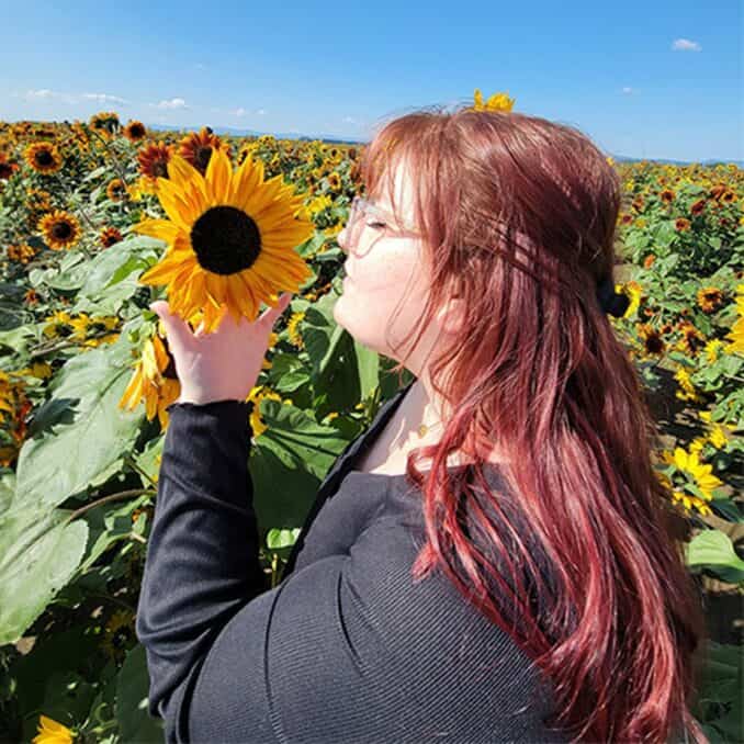 veronica keller onpoint employee spotlight june 2024 sunflower field