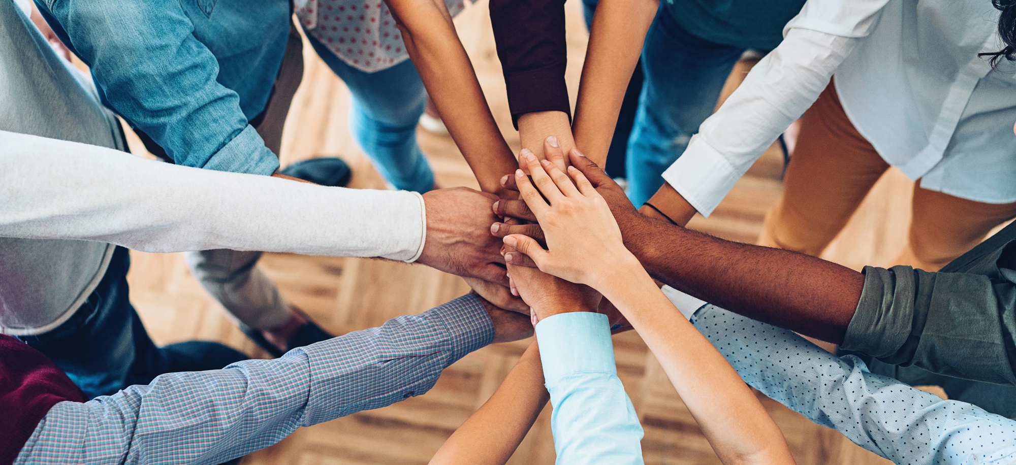 forming a circle and putting our hands together