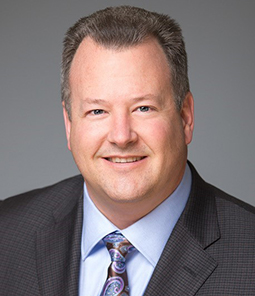 headshot of Greg Chandler