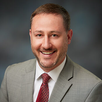 Studio portrait of Will Burton, OnPoint Commercial Relationship Manager