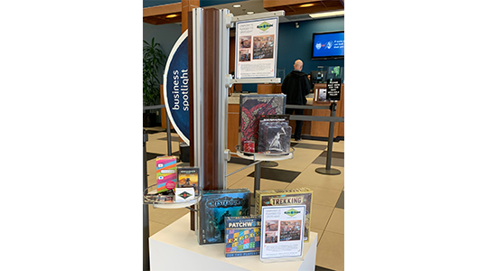 Business Spotlight display at OnPoint branch featuring Rune and Board