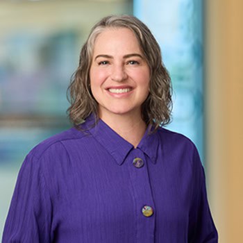 Jessica Chesnut OnPoint Mortgage Professional Headshot Bank Back drop
