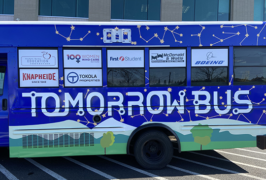 Image of the Tomorrow Bus, a mobile STEAM (Science, Technology, Engineering, Art and Math) classroom.