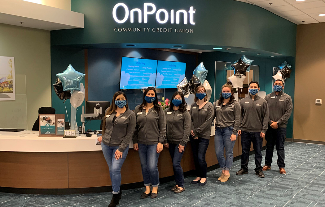 OnPoint Cornelius Branch staff line up for a photo on their first day open.