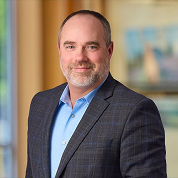 Matt Dukart OnPoint Mortgage Professional Headshot Bank Back drop