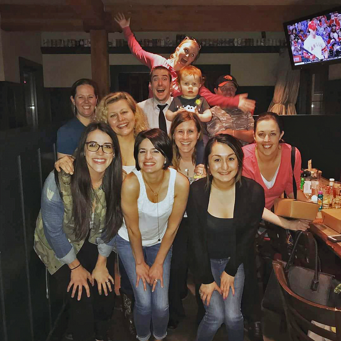 Alex Phillips with coworkers on bingo night in Bend Oregon