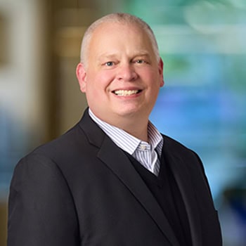 Jon Eisner OnPoint Mortgage Professional Headshot Bank Back drop