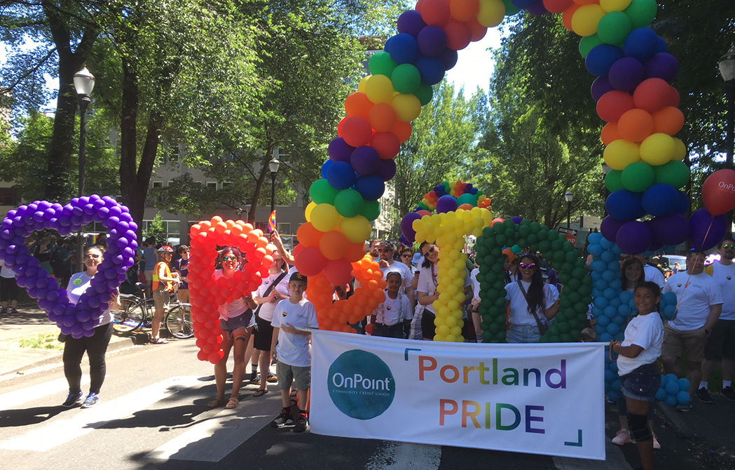 OnPoint employees march in 2018 PrideFest