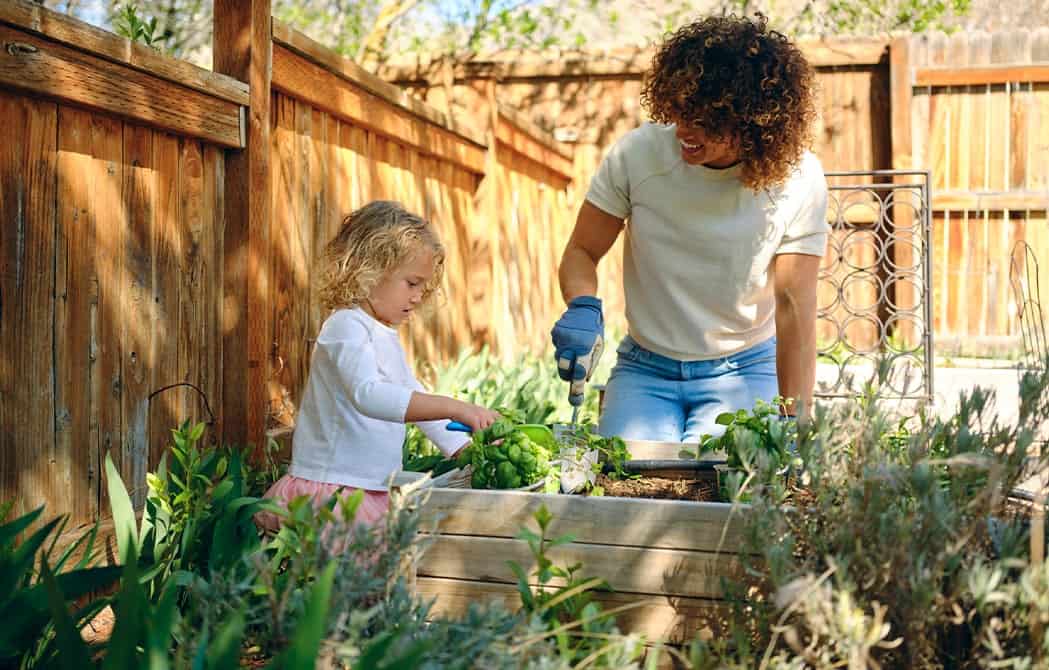 Mother and daughter gardening