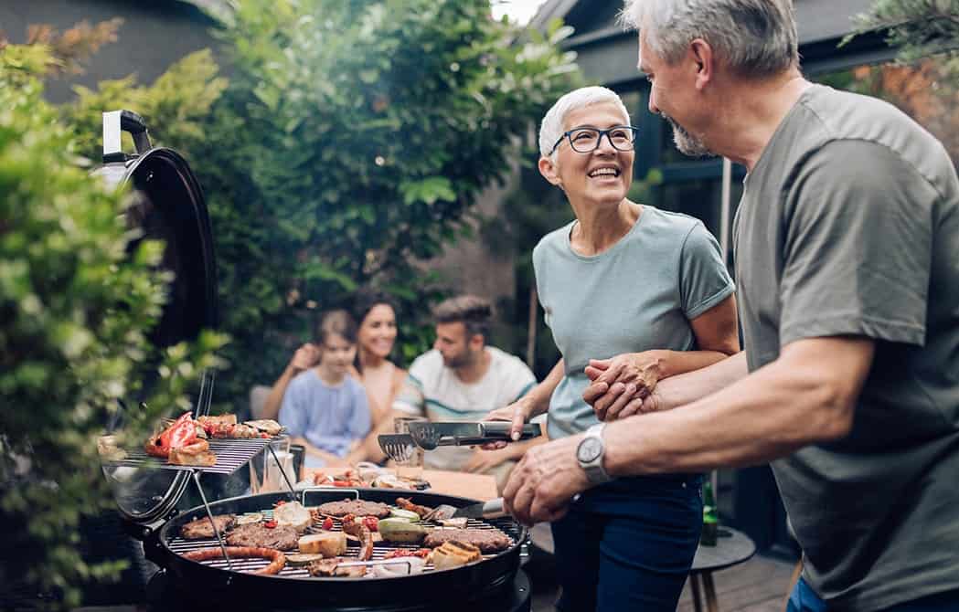 family enjoying dinner outside