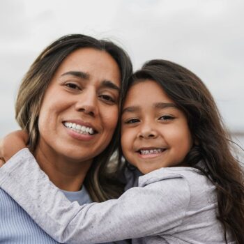 mom-and-daughter-smiling-together