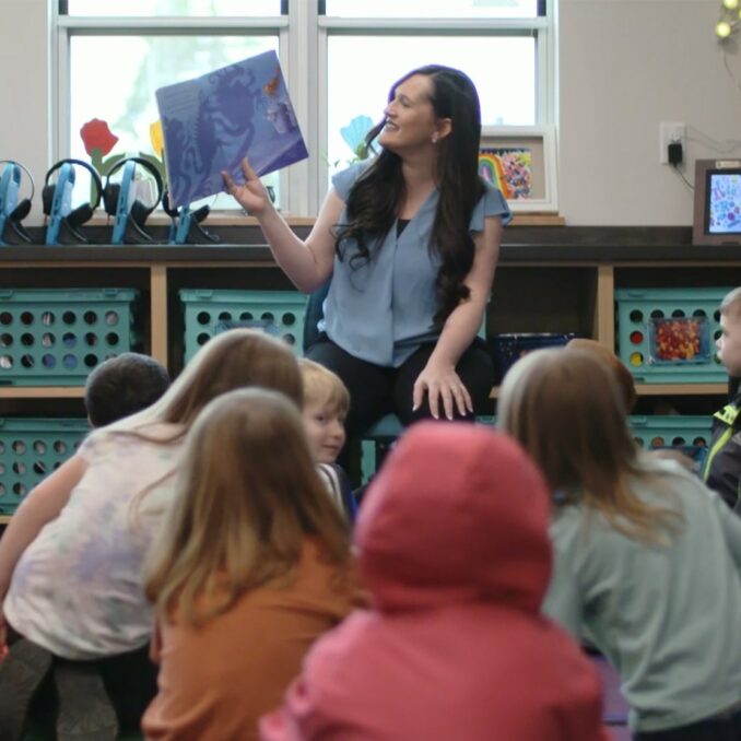 Jennifer Krebs reading to her classroom