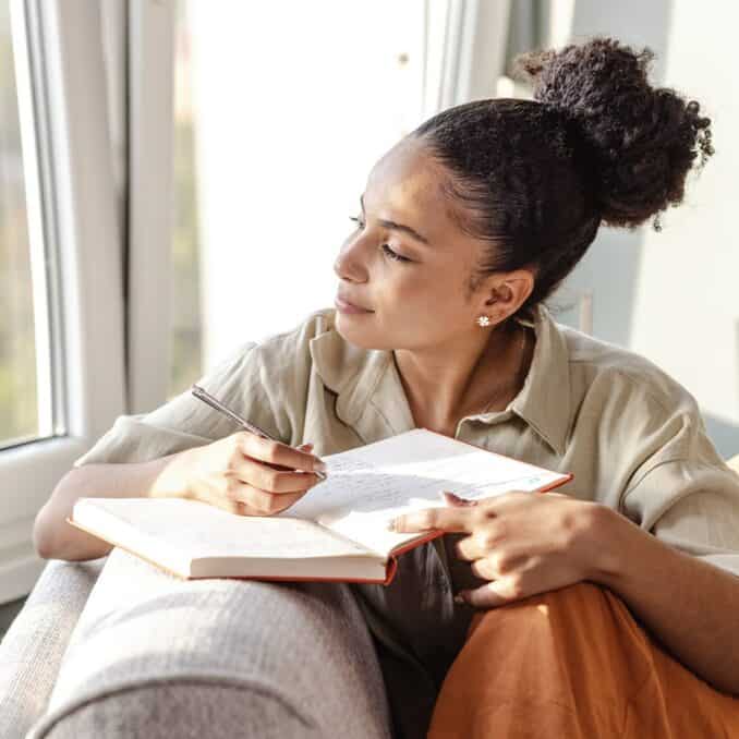 woman-writing in her journal