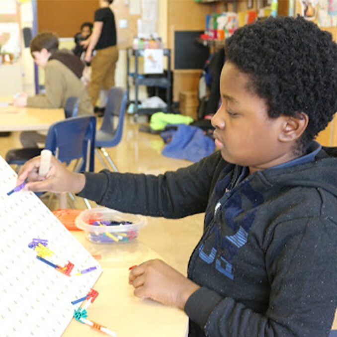 Kid working on a school project