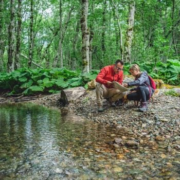 _two-people-on-a-creek