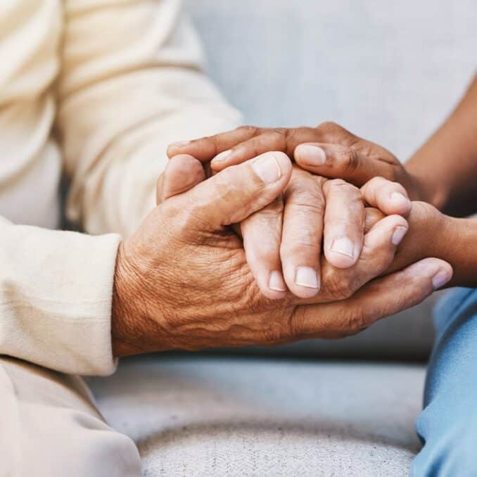 two-people-holding-hands