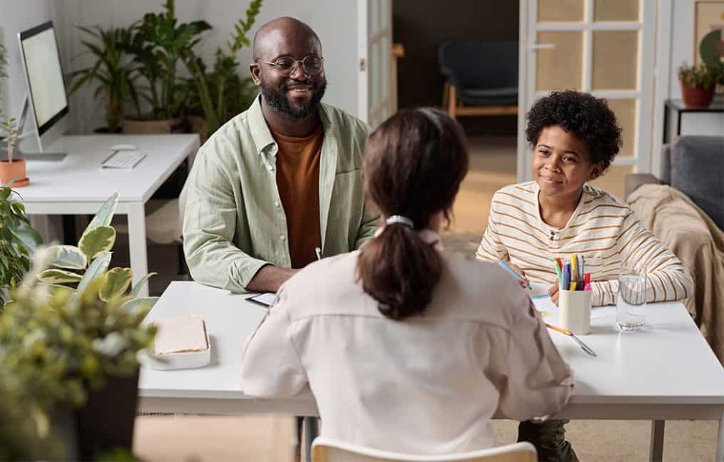 financial counseling onpoint community credit union father and son working with counselor